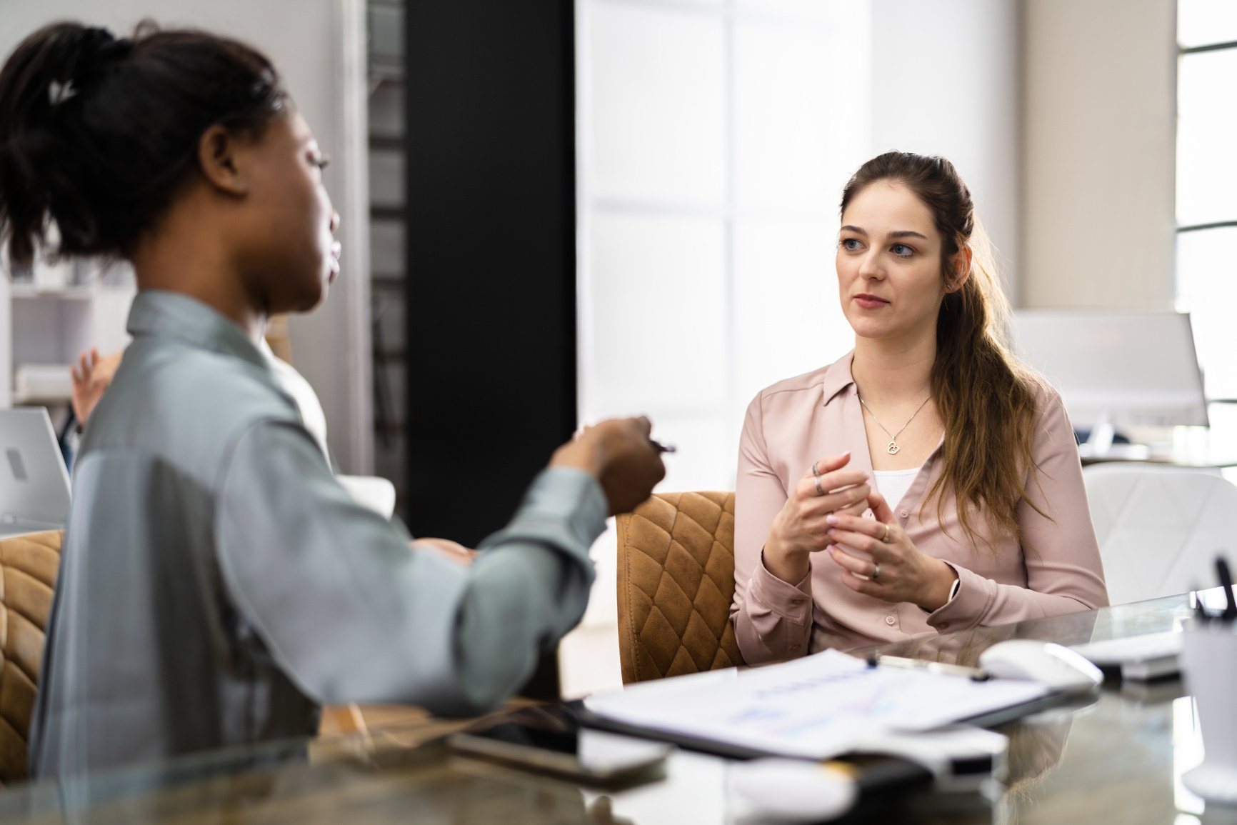 Two Business People Talking